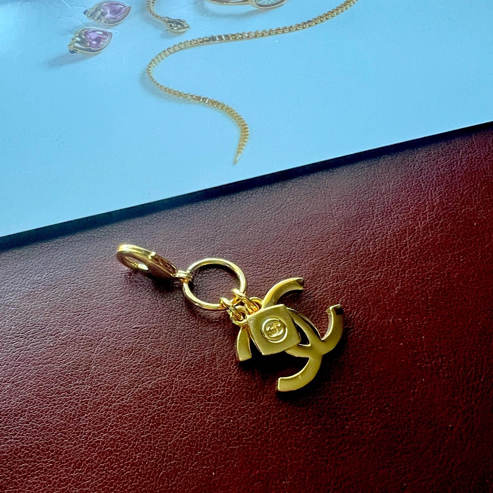 Authentic Chanel gold tone charm